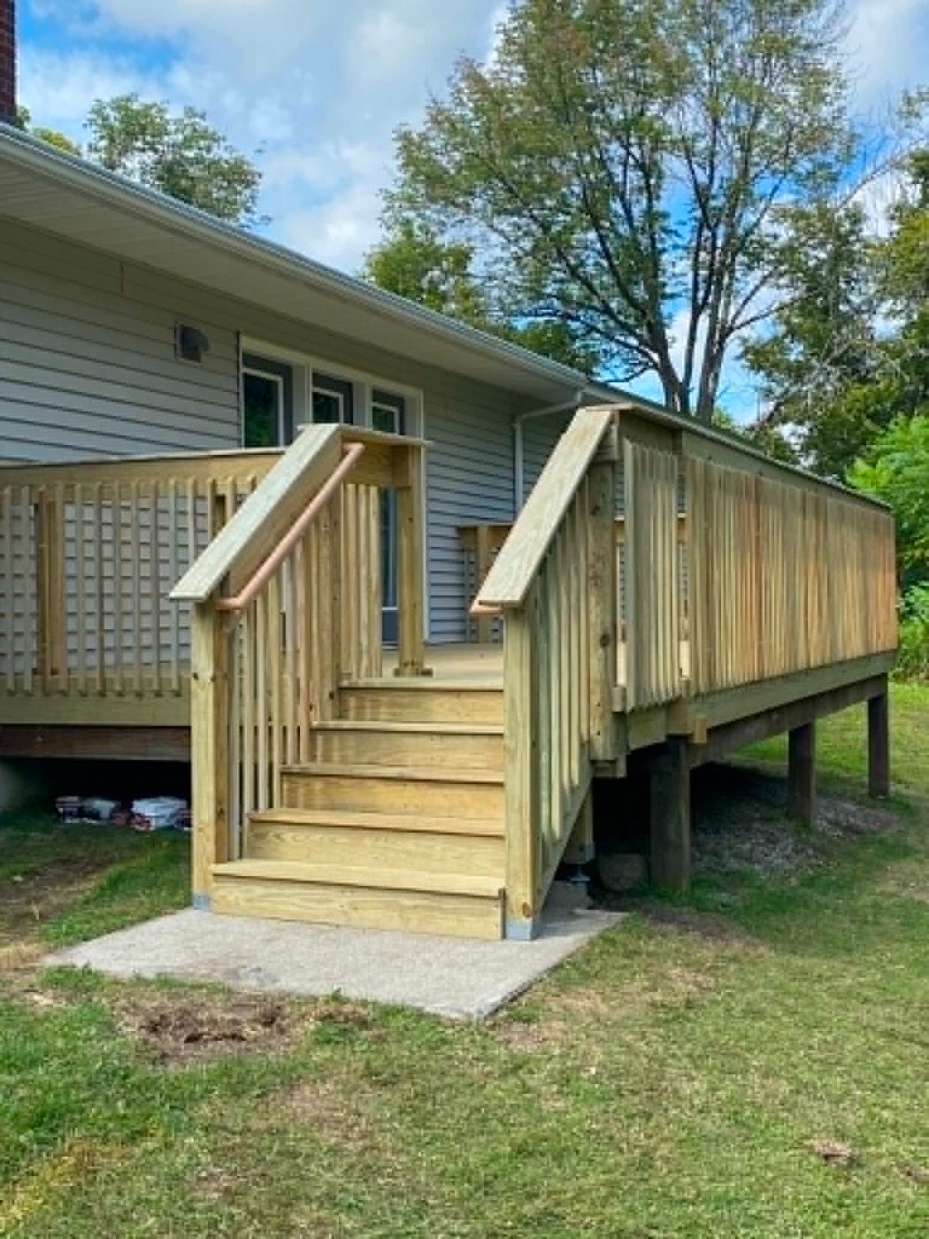Deck stairs and lattice detail on a rebuilt deck